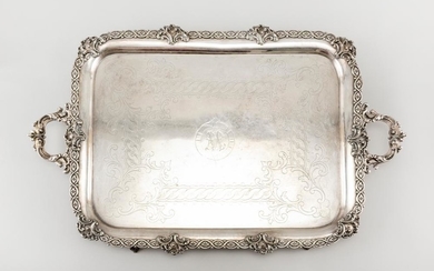 SILVER PLATED TRAY Unidentified marks. With fine, cast and hand-chased rim, handles and feet. Central monogram surrounded by a garte...