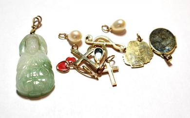 Six 9 carat gold charms/pendants including two crosses, a locket,...