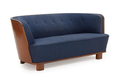 SOLD. Søren Willadsen, ascribed to: Three seater sofa with mahogany frame, upholstered with blue fabric. L. 187 cm. – Bruun Rasmussen Auctioneers of Fine Art