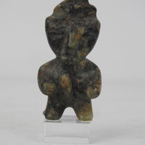Statuette in hard stone, speckled green. Most probably Mexico, city...