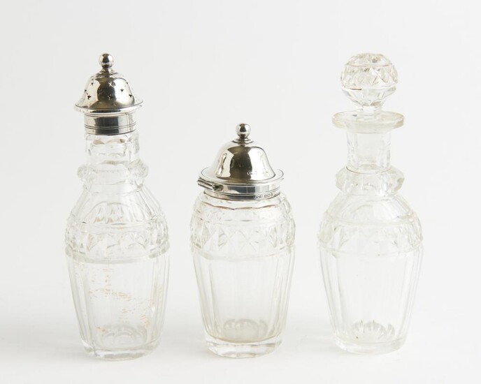 THREE VICTORIAN CONDIMENT BOTTLES INCLUDING A STERLING SILVER MOUNTED MUSTARD POT AND A SILVER TOPPED CASTOR, TALLEST H.17CM, LEONAR...