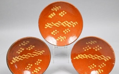 Three Pennsylvania Redware Slip-Decorated Plates