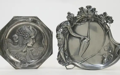 Two WMF pewter plates, early 20th century, comprising a hanging plate depicting...