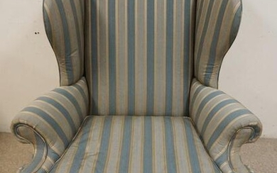 UPHOLSTERED WING BACK CHAIR