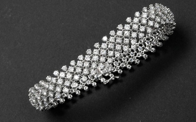 Vrij exceptioneel bracelet (soort "manchette") en witgoud (18 carats) met vijf rangen briljanten - in...