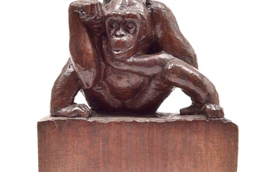 Wooden sculpture of monkey seated on a high...