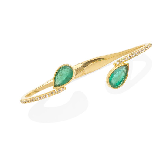 an emerald and diamond bangle