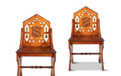 A PAIR OF 19TH CENTURY OAK HALL CHAIRS, the pointe…