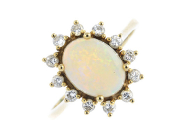 A 9ct gold opal and diamond cluster ring.