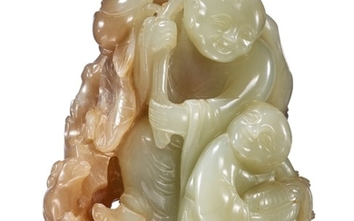 A CELADON AND BEIGE JADE 'HEHE ERXIAN' GROUP QING DYNASTY, 17TH / 18TH CENTURY