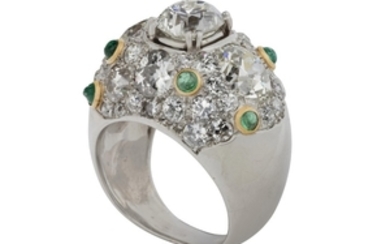 A DIAMOND AND EMERALD RING