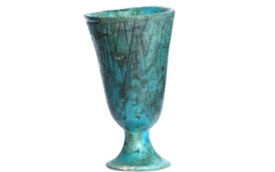 AN EGYPTIAN GLAZED COMPOSITION LOTUS CUP New Kingdom,...