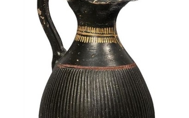An Etruscan red and black glazed pottery...