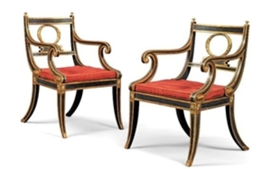 A PAIR OF ORMOLU-MOUNTED, PARCEL-GILT AND EBONISED ARMCHAIRS, CIRCA 1810, IN THE MANNER OF HENRY HOLLAND
