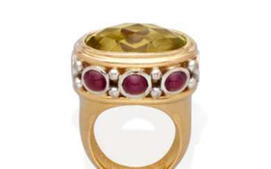A quartz, cabochon ruby, carved moonstone and bi-color gold ring