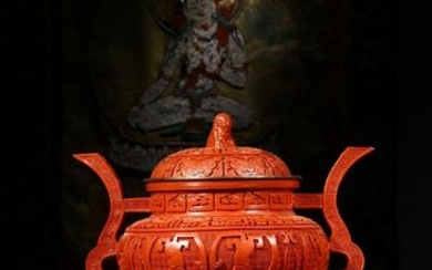 A RED LACQUER TRIPOD EAR CENSER WITH COVER