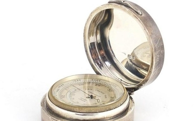 Silver cased compensated barometer retailed by Asprey