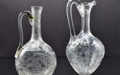 TWO ENGLISH WHEEL-ENGRAVED COLORLESS GLASS EWERS