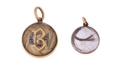 Two rock crystal and enamel mourning lockets, last