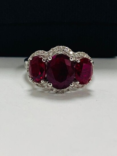 14ct White Gold Ruby and Diamond ring featuring...