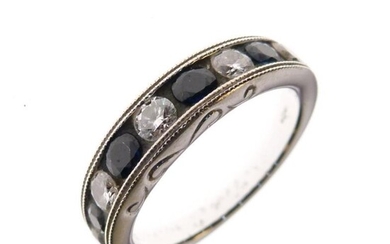 18ct white gold, sapphire and diamond half eternity ring,...