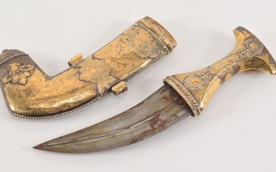 19th century Tombok Jambiaya gilt silver knife. Etched sheath decoration. Hallmarks on scabbard.