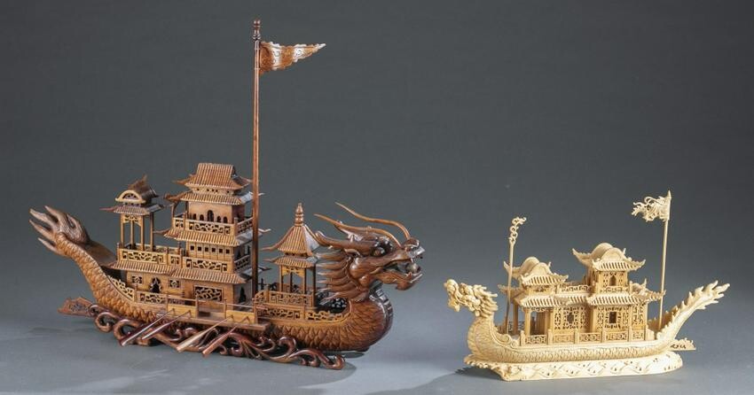 2 Chinese carved wooden dragon boats.
