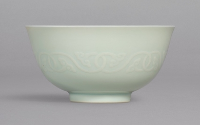 A FINE AND RARE MOULDED CELADON-GLAZED 'RUYI' BOWL MARK AND PERIOD OF YONGZHENG