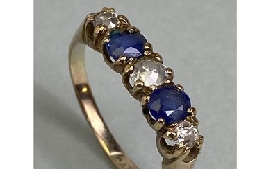 9ct yellow gold five stone ring set with two Sapphires and t...