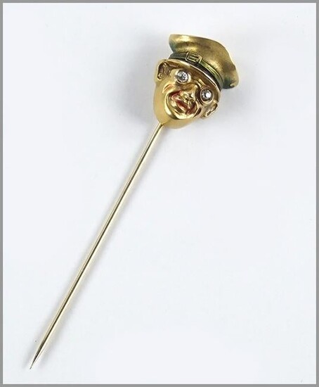 A 14 Karat Yellow Gold Stick Pin.