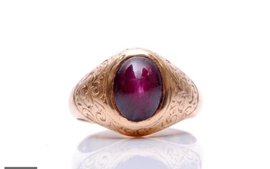 A 14ct star ruby ring, single cabochon collar set stone to f...