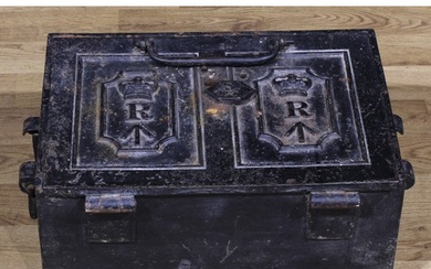A 19th century cast iron military strongbox or safe, hinged ...