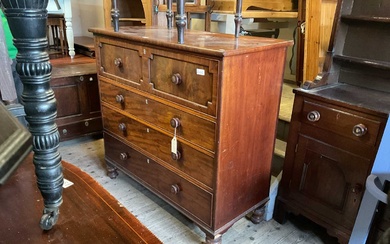 A 19th century mahogany chest of four drawers, with turned...
