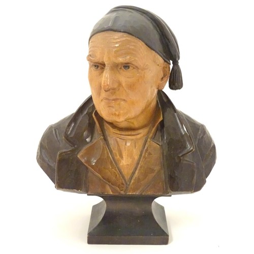 A 19thC carved wooden bust of a Sicilian fisherman on a squa...