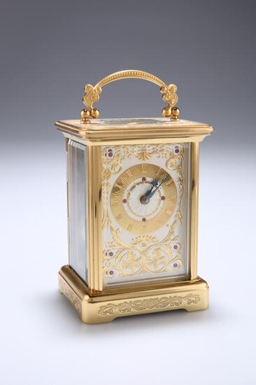 A 20TH CENTURY GILT METAL CASED CARRIAGE CLOCK, SIGNED