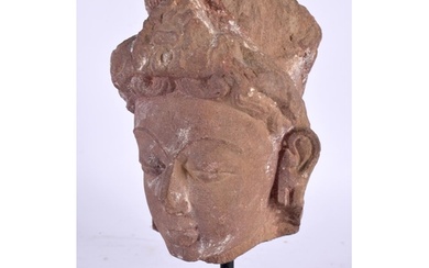 A 7th/8th Century Pink Sandstone Head of a Female Deity, Mad...