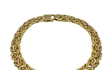A 9ct yellow gold flat Byzantine chain bracelet. With lobster...