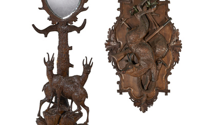 A BLACK FOREST CARVED WALNUT HUNTING TROPHY AND HALL STAND...