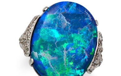 A BLACK OPAL AND DIAMOND RING set with a cabochon black opal of approximately 10.00 carats, the