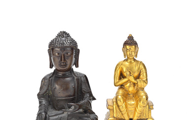 A BRONZE MODEL OF AMITABHA BUDDHA AND A GILT BRONZE...