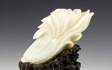 A CHINESE CARVED WHITE JADE CHINESE CABBAGE PAK CHOI