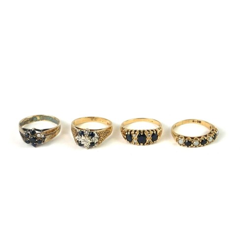 A COLLECTION OF VINTAGE 9CT GOLD AND SAPPHIRE RINGS A half ...