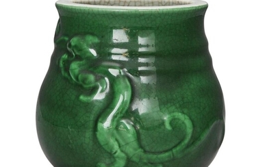 A Chinese monochrome apple green moulded 'chilong' vase, 19th century, of pear-shaped form moulded with a chilong below ribbed neck, the interior and base covered in a crackled glaze of pale celadon tone, rim covered in white glaze, 13cm high 十九世紀...