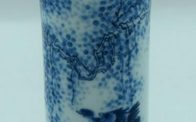 A Chinese porcelain brush pot decorated with birds and