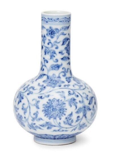 A Chinese porcelain 'lotus' small bottle vase, Qianlong mark and of the period, painted in underglaze blue with leafy flowering lotus stems, underglaze blue seal mark to base, 13cm high, fitted bamboo box