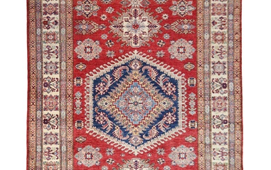 A Fine Afghan Kazak Ferehan (234x171 cm). Amongst the finest of Afghan tribal weaves. Using the finest of Afghan hand spun wool. The dyes used are vegetable dyes. The wool has a silky lustre. The design is inspired by...