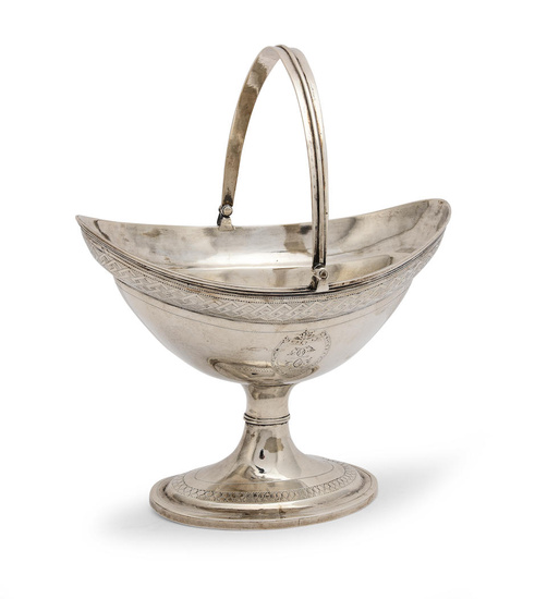 A George III Irish silver swing handle sugar basket Dublin...