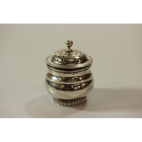 A George III Sterling Silver Pepperette. London 1817. makers...