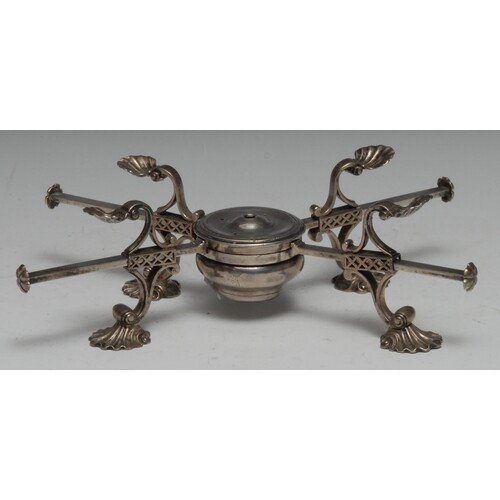 A George III silver dish cross, scallop shell rests and feet...