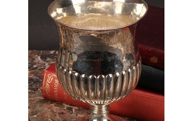 A George III silver half-fluted pedestal wine goblet, domed ...